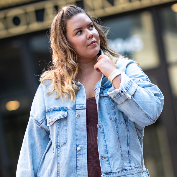 Woman in denim jacket